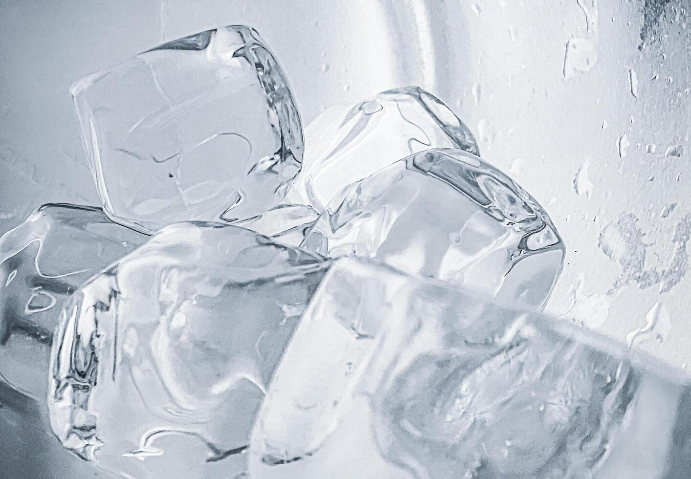 icecubes background,icecubes texture,icecubes wallpaper,ice helps to feel refreshed and cool water from the icecubes helps the water refresh your life and feel good.ice drinks for refreshment business photo
