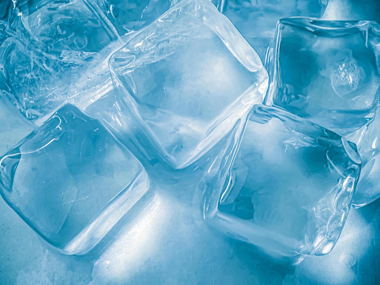 icecubes background,icecubes texture,icecubes wallpaper,ice helps to feel refreshed and cool water from the icecubes helps the water refresh your life and feel good.ice drinks for refreshment business photo