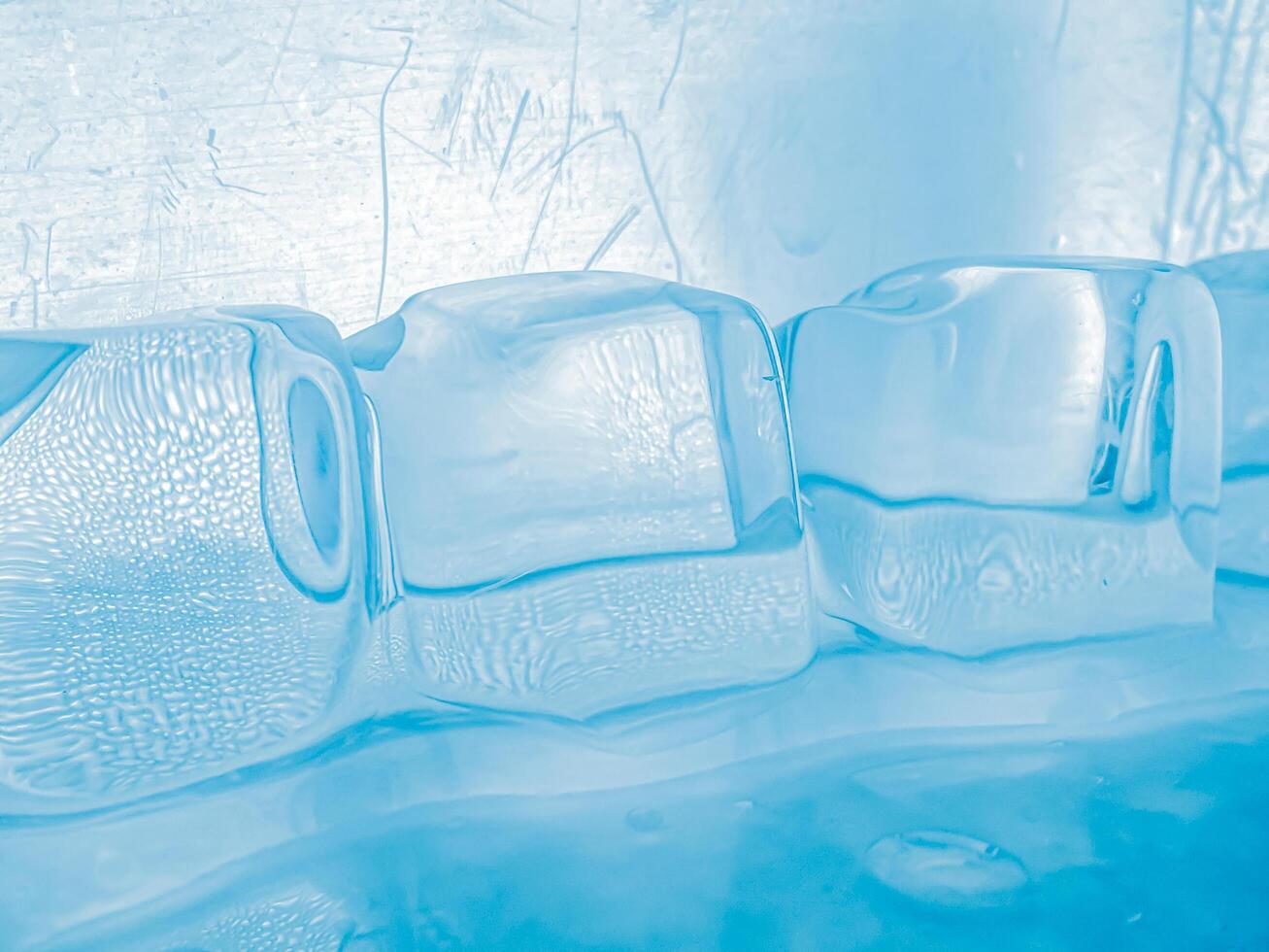 icecubes background,icecubes texture,icecubes wallpaper,ice helps to feel refreshed and cool water from the icecubes helps the water refresh your life and feel good.ice drinks for refreshment business photo