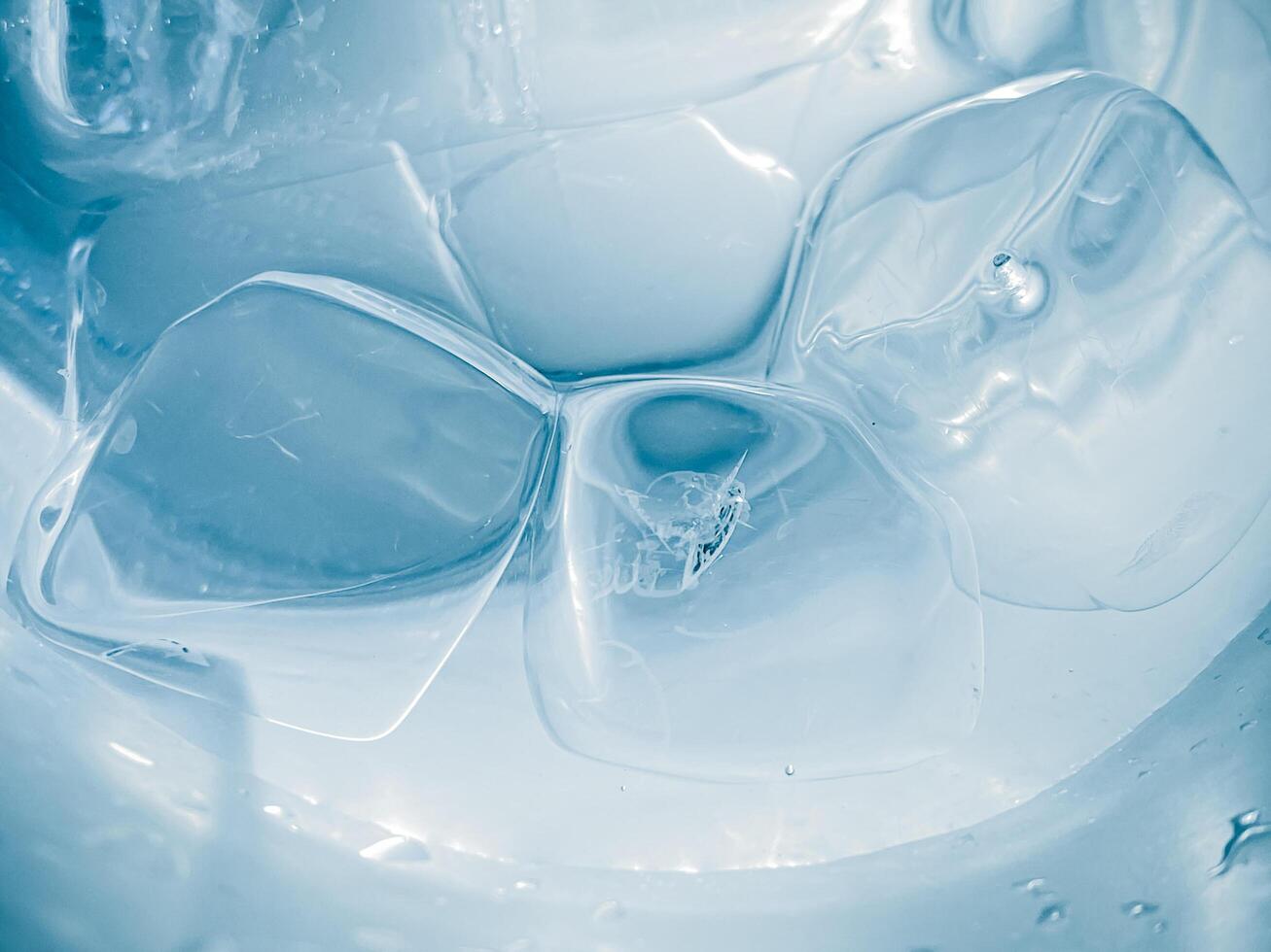 icecubes background,icecubes texture,icecubes wallpaper,ice helps to feel refreshed and cool water from the icecubes helps the water refresh your life and feel good.ice drinks for refreshment business photo