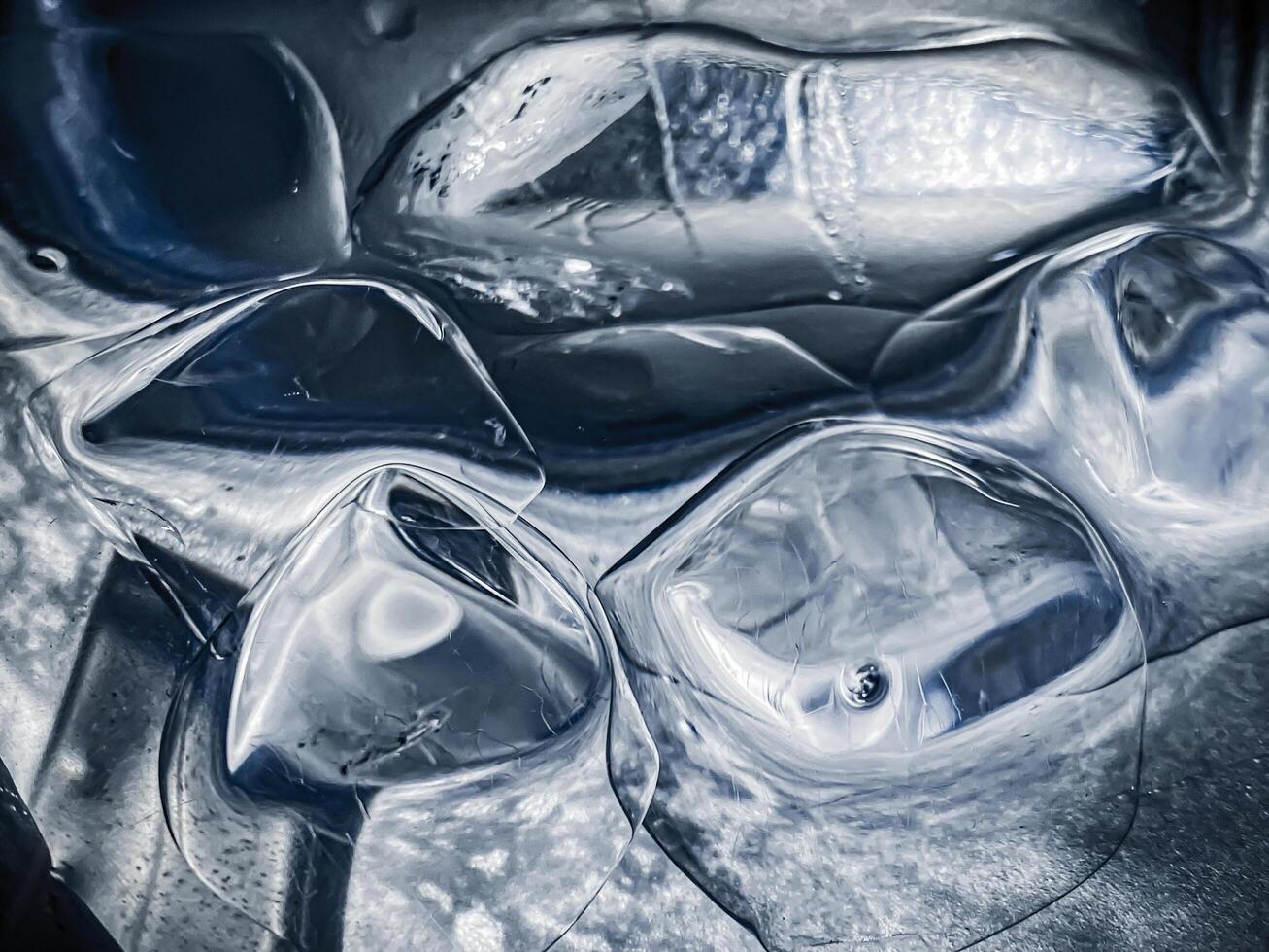 icecubes background,icecubes texture,icecubes wallpaper,ice helps to feel refreshed and cool water from the icecubes helps the water refresh your life and feel good.ice drinks for refreshment business photo