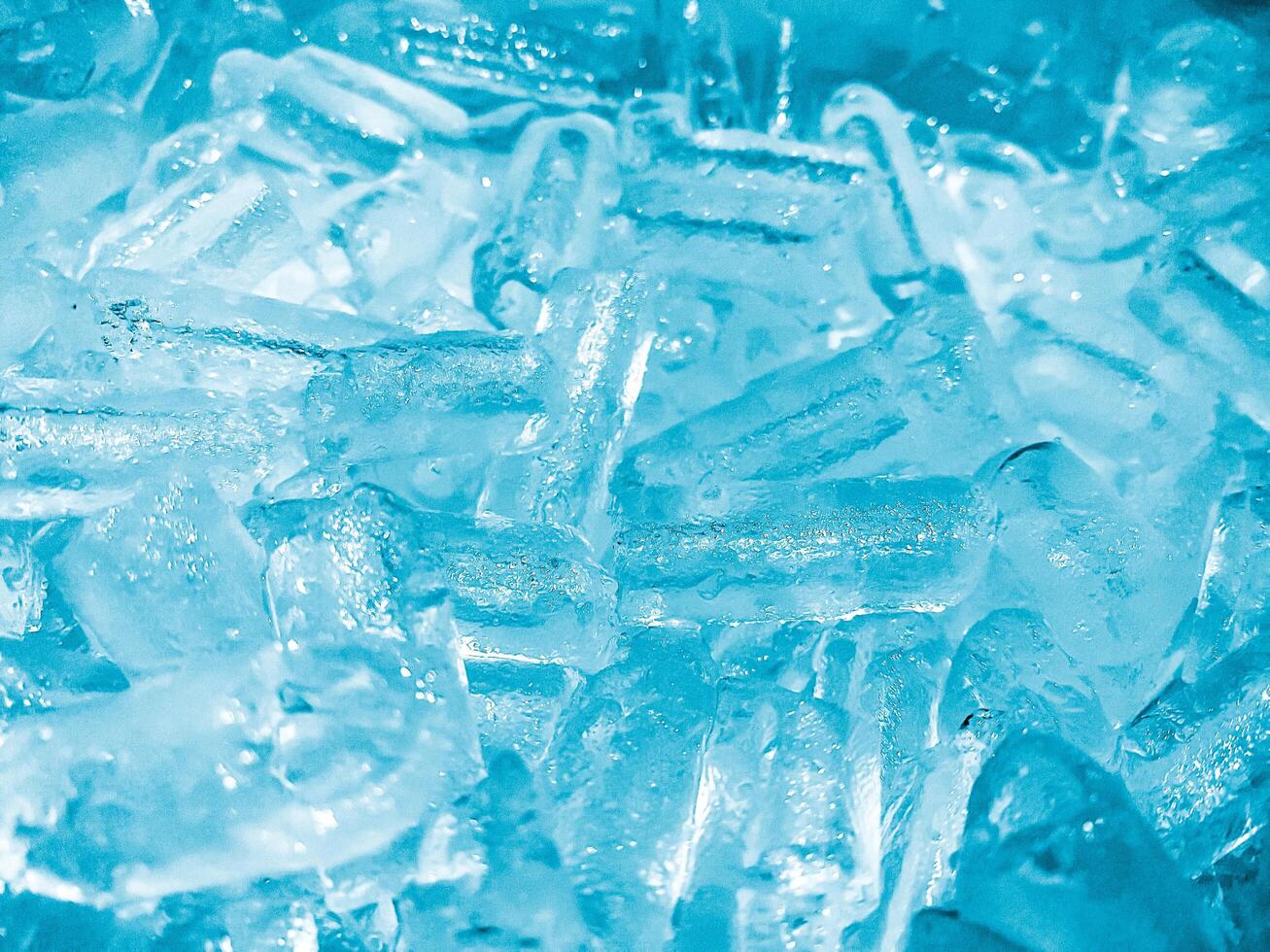 icecubes background,icecubes texture,icecubes wallpaper,ice helps to feel refreshed and cool water from the icecubes helps the water refresh your life and feel good.ice drinks for refreshment business photo