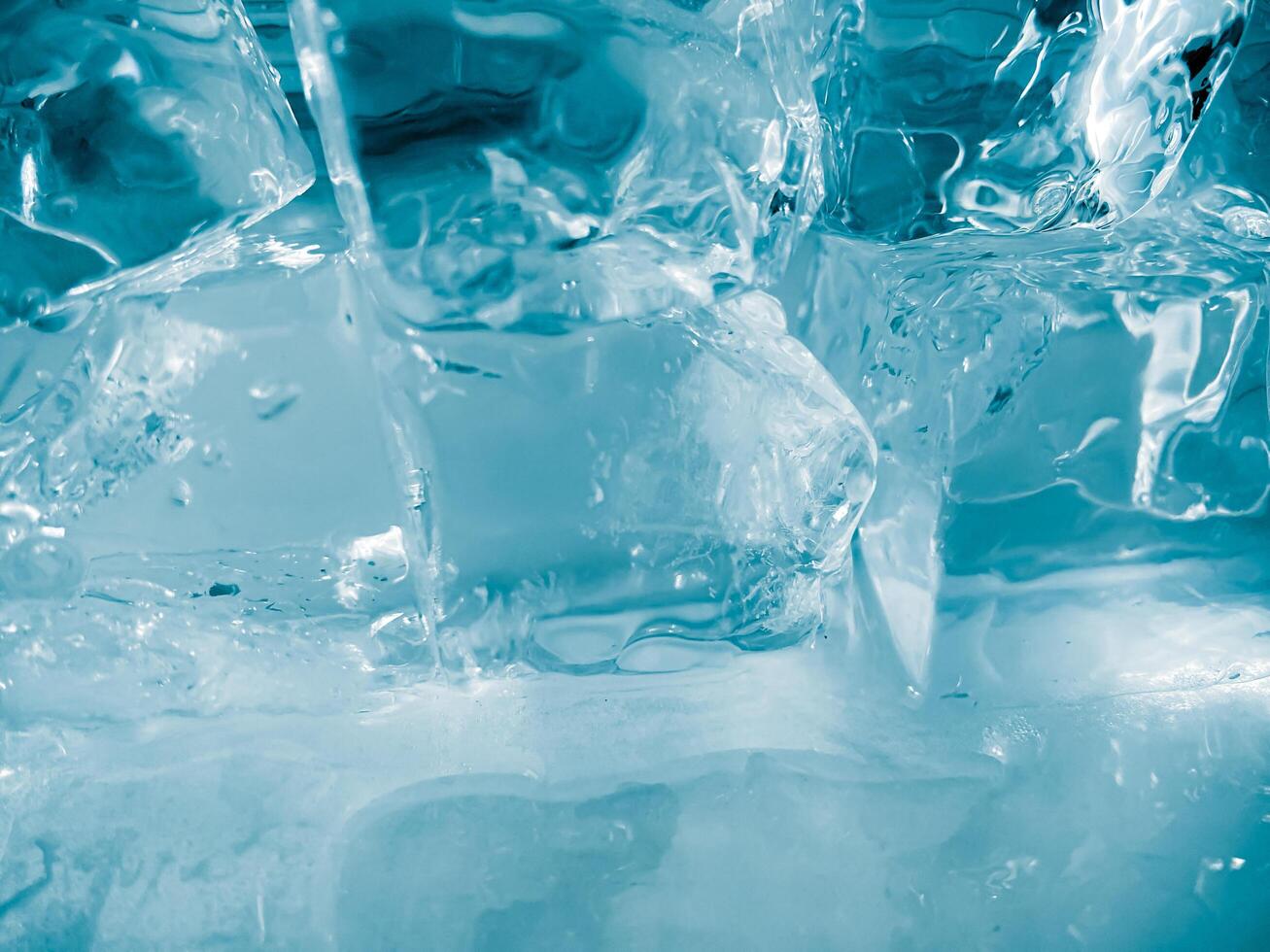 icecubes background,icecubes texture,icecubes wallpaper,ice helps to feel refreshed and cool water from the icecubes helps the water refresh your life and feel good.ice drinks for refreshment business photo