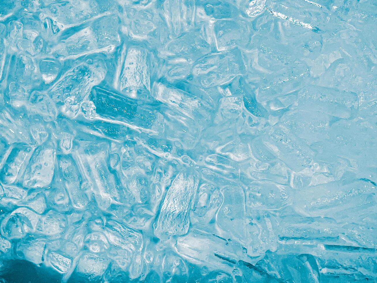 icecubes background,icecubes texture,icecubes wallpaper,ice helps to feel refreshed and cool water from the icecubes helps the water refresh your life and feel good.ice drinks for refreshment business photo