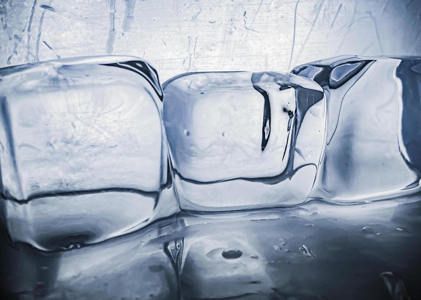icecubes background,icecubes texture,icecubes wallpaper,ice helps to feel refreshed and cool water from the icecubes helps the water refresh your life and feel good.ice drinks for refreshment business photo