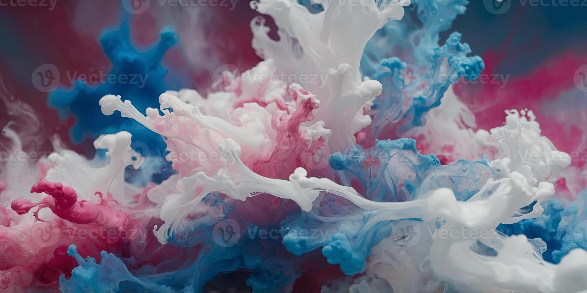 a mixture of white, pink, and blue ink is mixed together to create a multicolored abstract background. photo