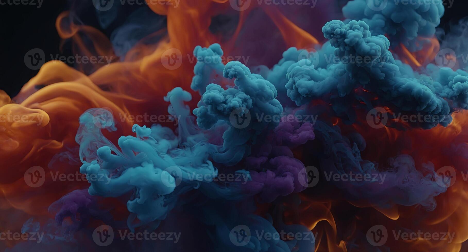 Dynamic close-up of fiery interplay with vibrant orange and red flames swirling through cool blue and purple smoke. photo