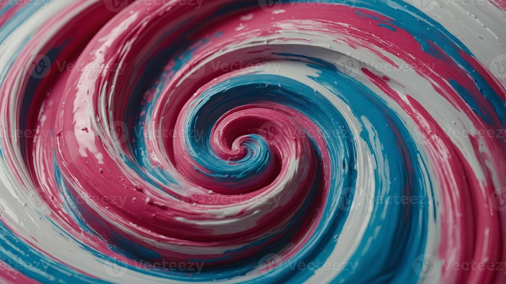 Closeup of a vibrant swirl, with hues of pink and blue on a white canvas. photo