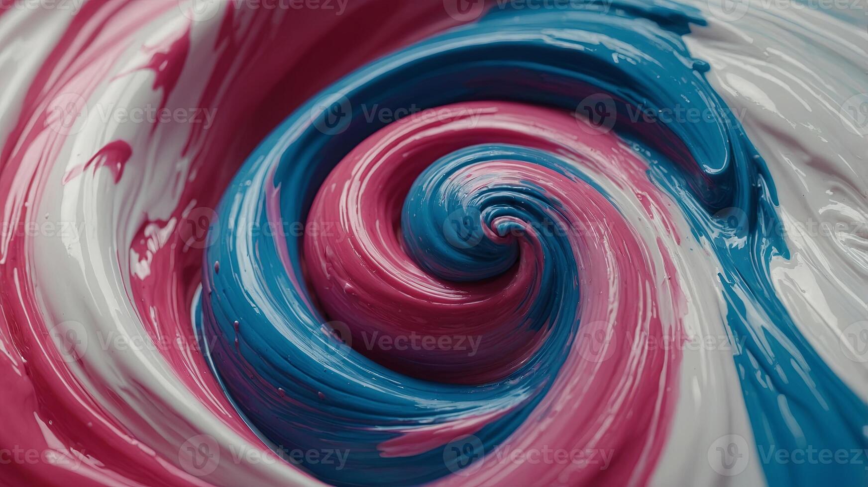 Closeup of a vibrant swirl, with hues of pink and blue on a white canvas. photo