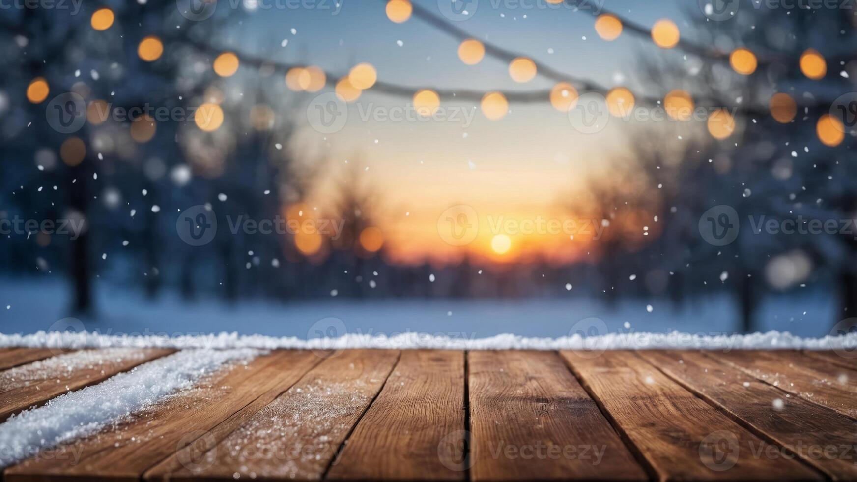 Wooden table top on blurred winter background with snow and bokeh lights - mockup for product display or montage. photo