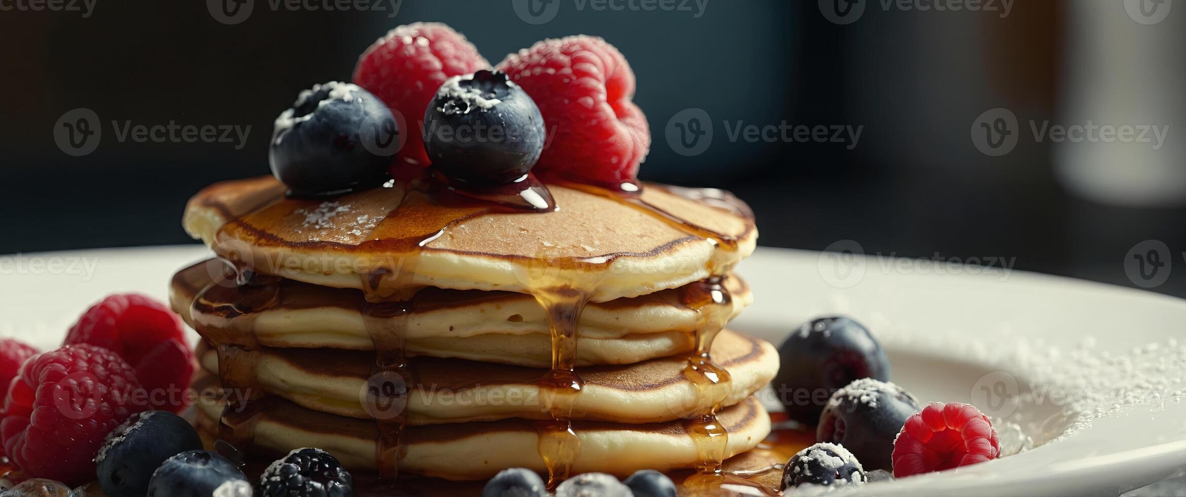 Close up of pancake stack with berries and ice cream. photo