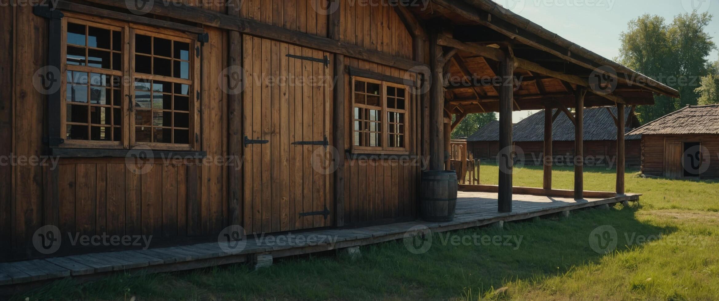 View of wooden stable buildings at summer day. photo