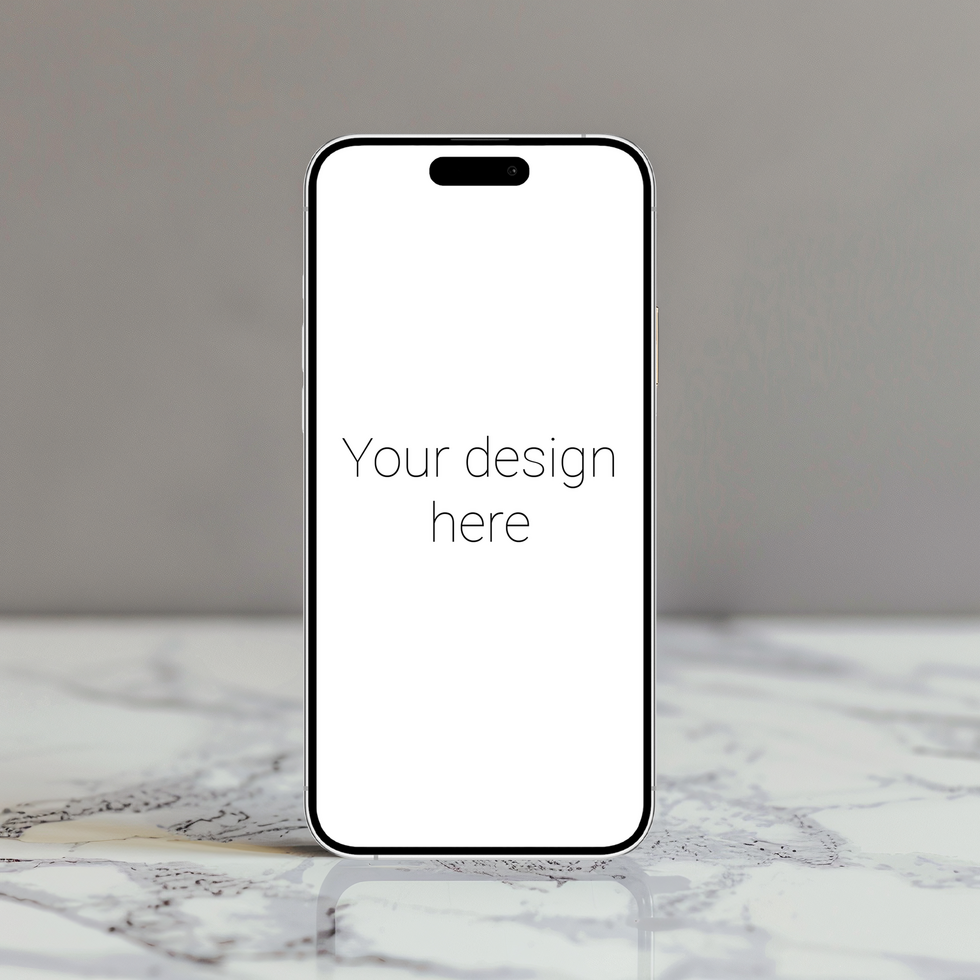 Mockup of white smartphone on marble surface psd