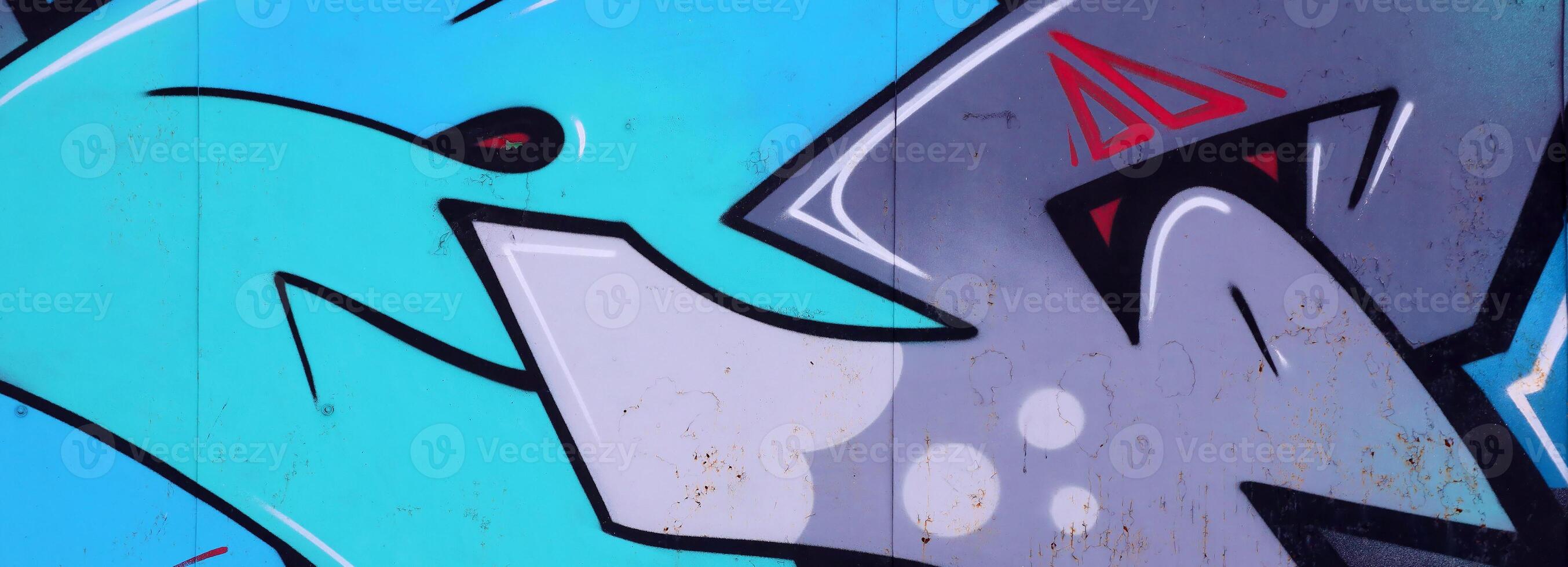 Colorful background of graffiti painting artwork with bright aerosol outlines on wall. Old school street art piece made with aerosol spray paint cans. Contemporary youth culture photo