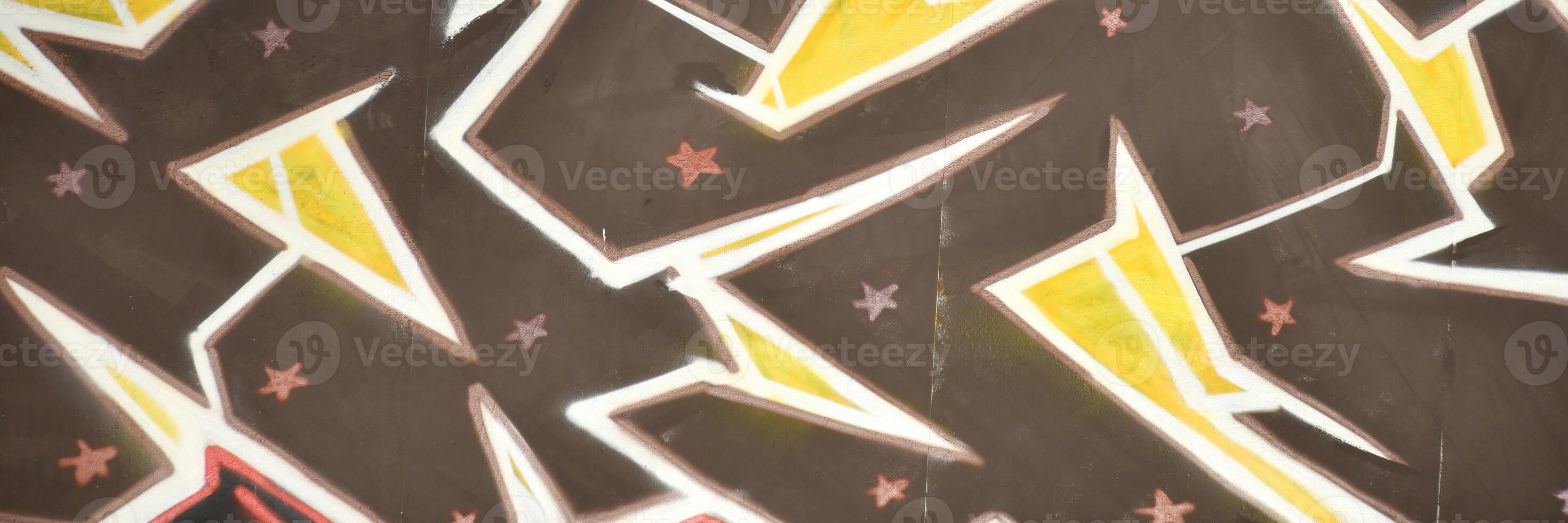 Colorful background of graffiti painting artwork with bright aerosol outlines on wall. Old school street art piece made with aerosol spray paint cans. Contemporary youth culture photo