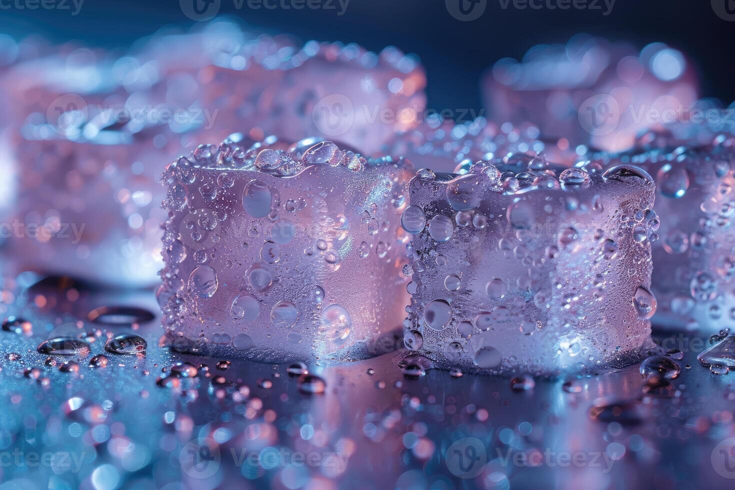 ice cubes with water drops on a dark surface photo