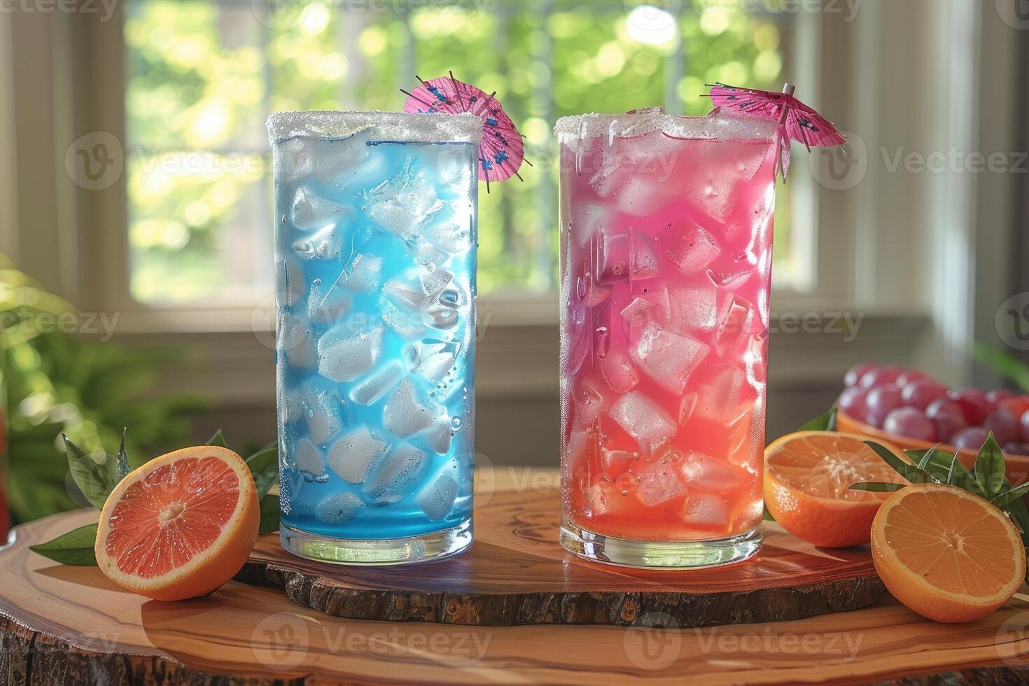 Two refreshing cocktails with ice garnished with fruit and miniature umbrellas resting on a wooden surface photo