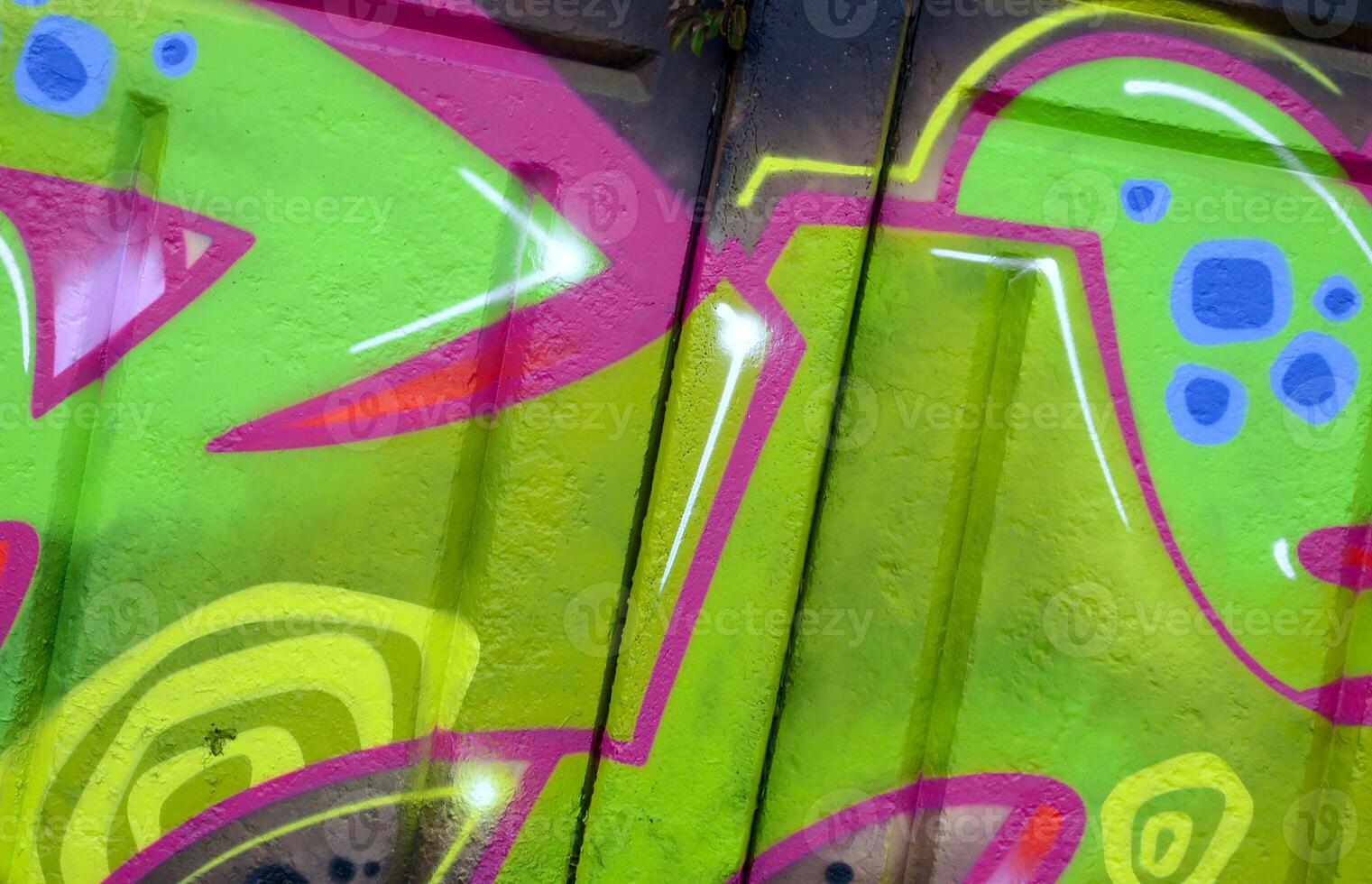 Colorful background of graffiti painting artwork with bright aerosol outlines on wall. Old school street art piece made with aerosol spray paint cans. Contemporary youth culture photo