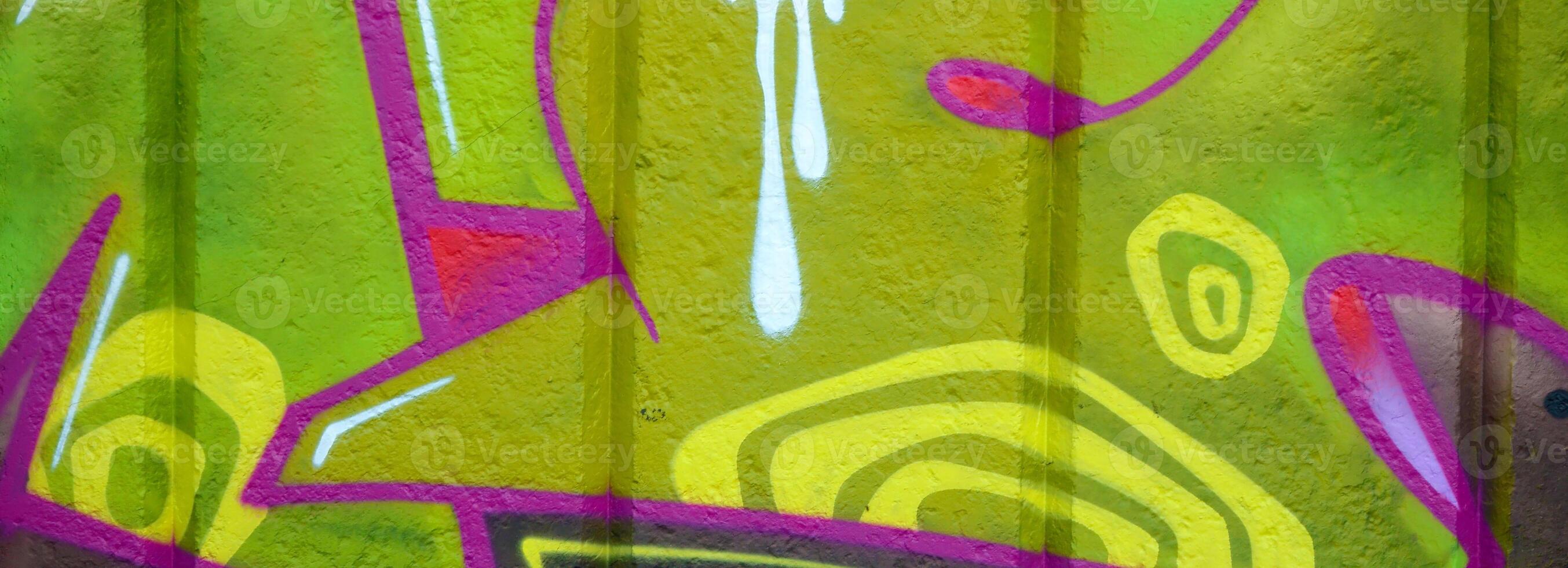 Colorful background of graffiti painting artwork with bright aerosol outlines on wall. Old school street art piece made with aerosol spray paint cans. Contemporary youth culture photo