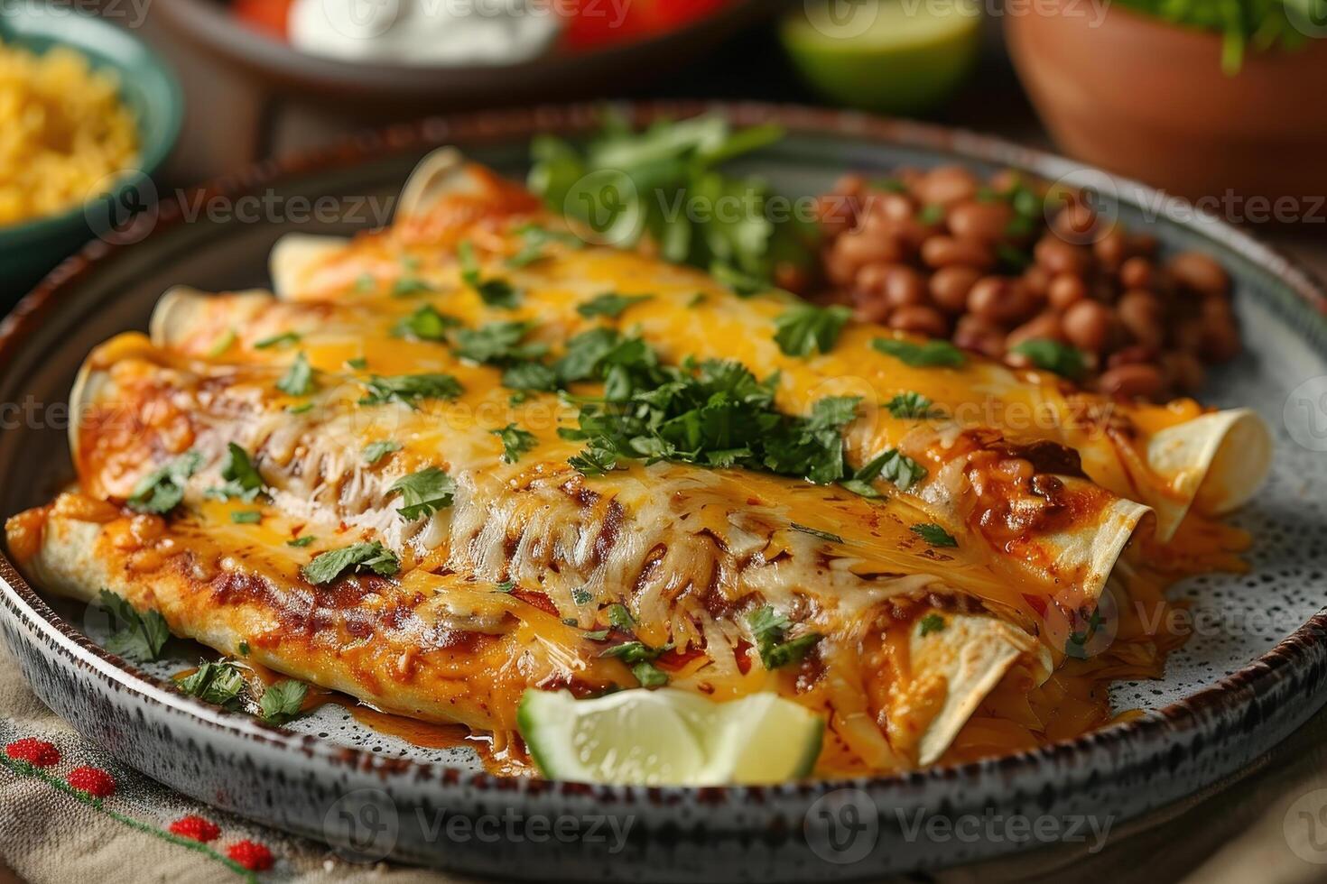 A vibrant plate of chicken enchiladas topped with melted cheese, garnished with fresh cilantro and a drizzle of sour cream, served with a side of Mexican rice and refried beans. photo