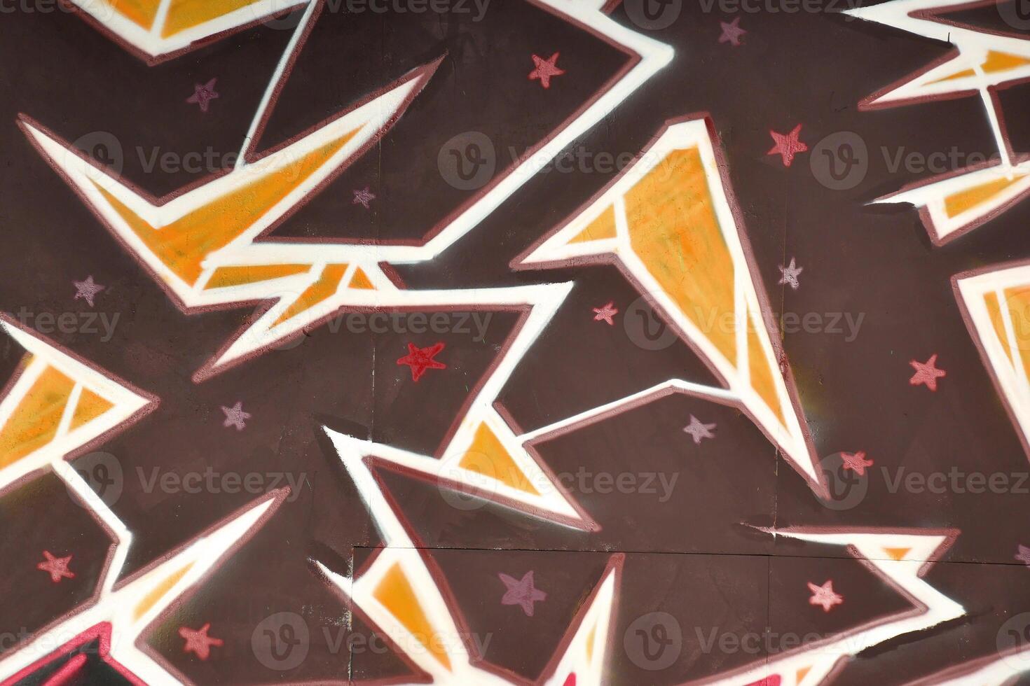 Colorful background of graffiti painting artwork with bright aerosol outlines on wall. Old school street art piece made with aerosol spray paint cans. Contemporary youth culture photo