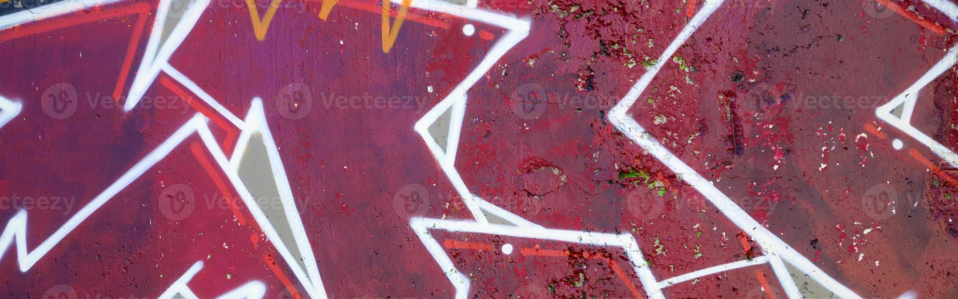 Colorful background of graffiti painting artwork with bright aerosol outlines on wall. Old school street art piece made with aerosol spray paint cans. Contemporary youth culture photo