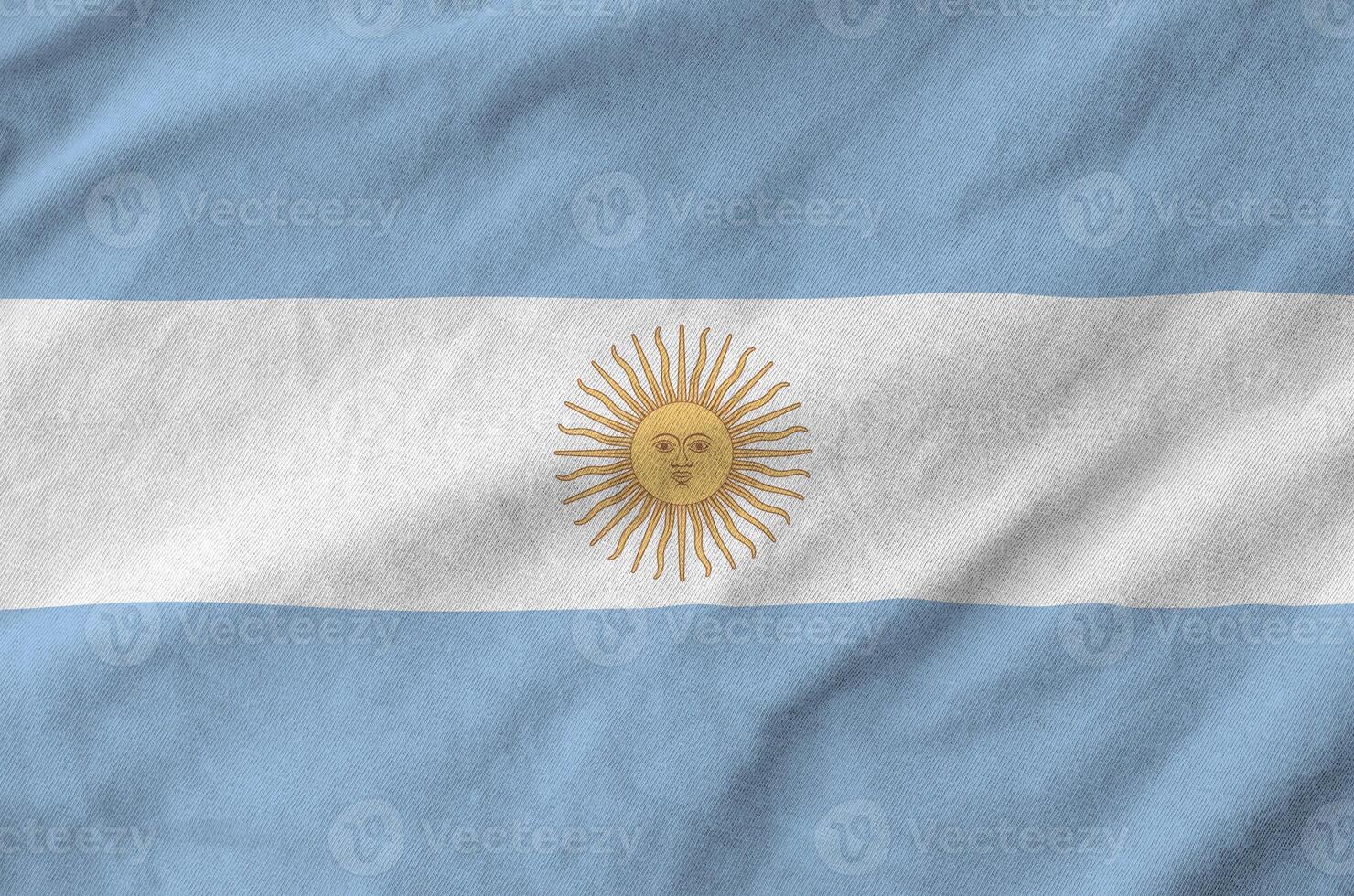 Argentina flag depicted on folded wavy fabric of old cloth photo