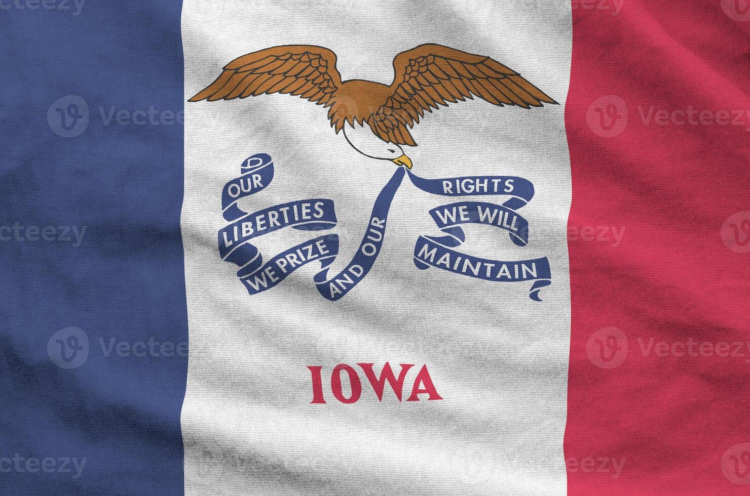 Iowa US state flag depicted on folded wavy fabric of old cloth photo