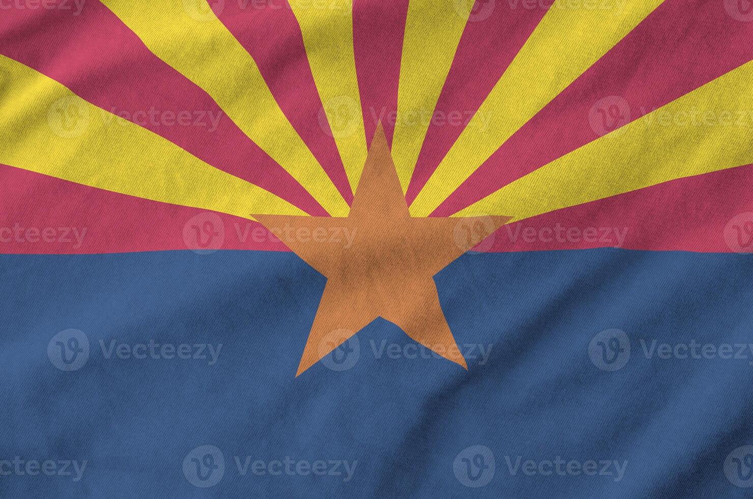 Arizona US state flag depicted on folded wavy fabric of old cloth photo