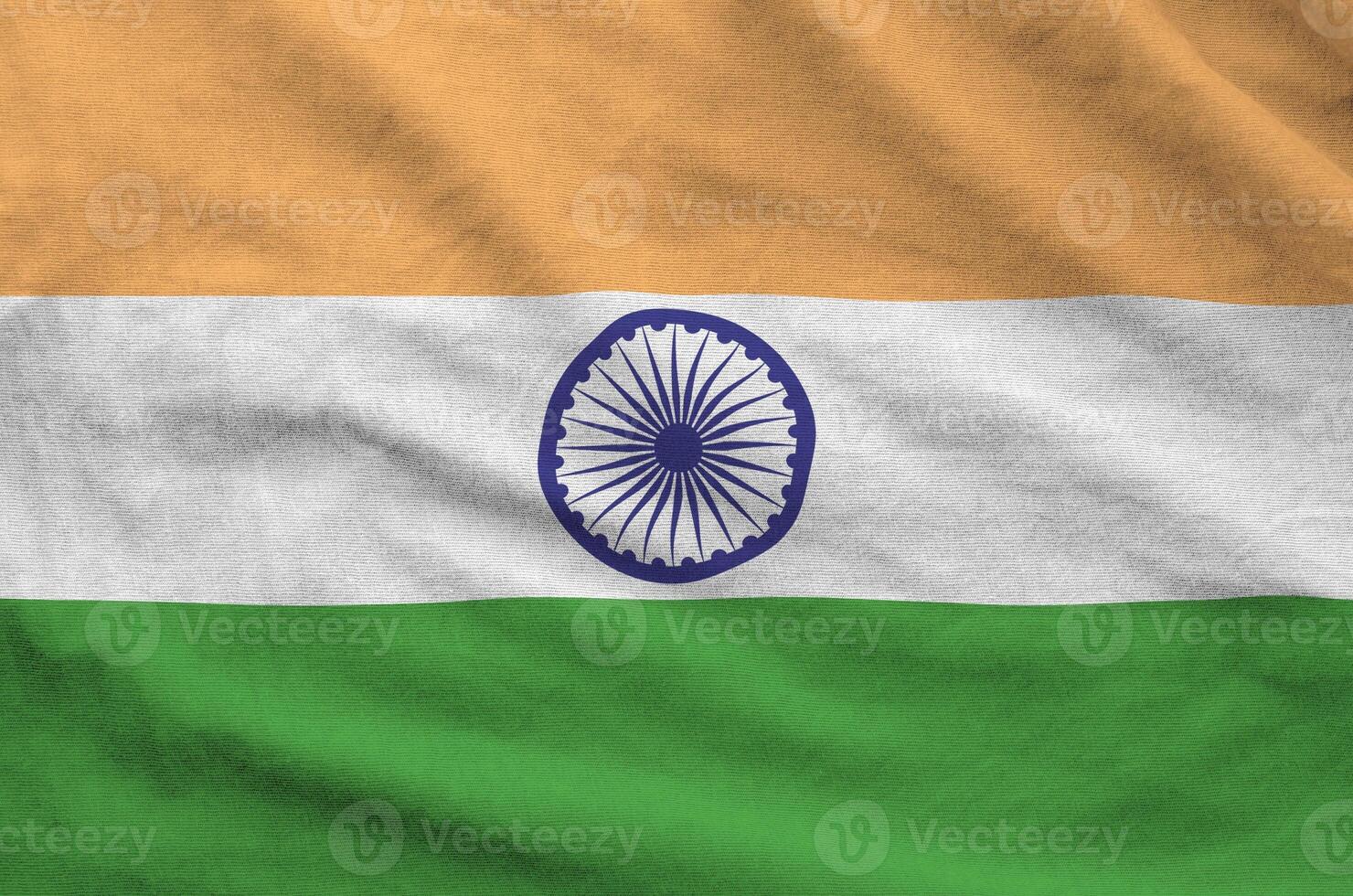 India flag depicted on folded wavy fabric of old cloth photo