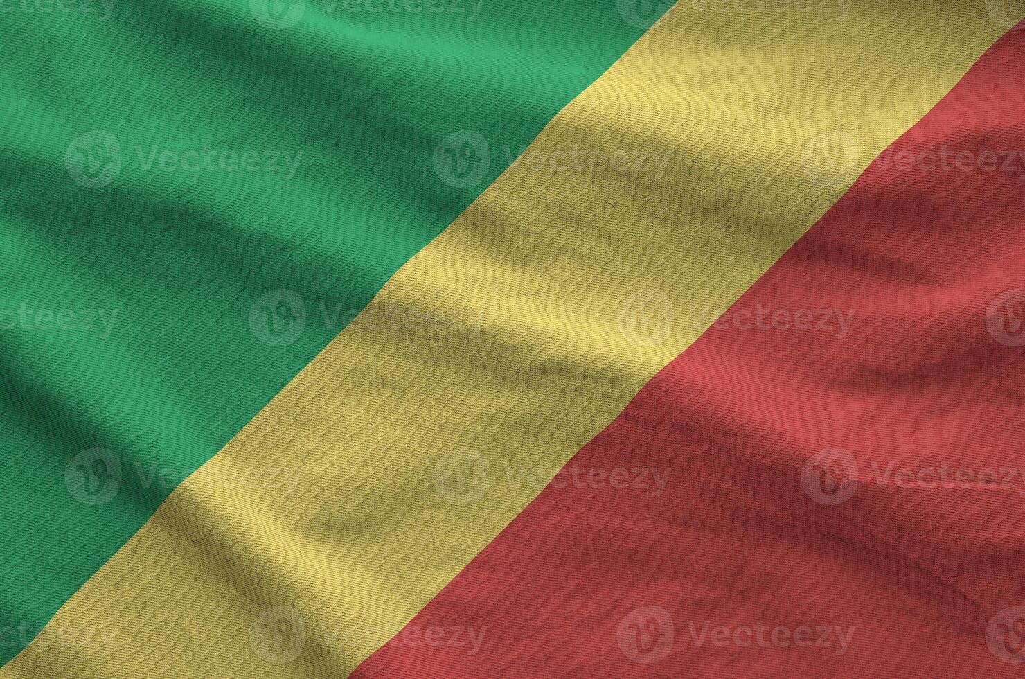 Congo flag depicted on folded wavy fabric of old cloth photo