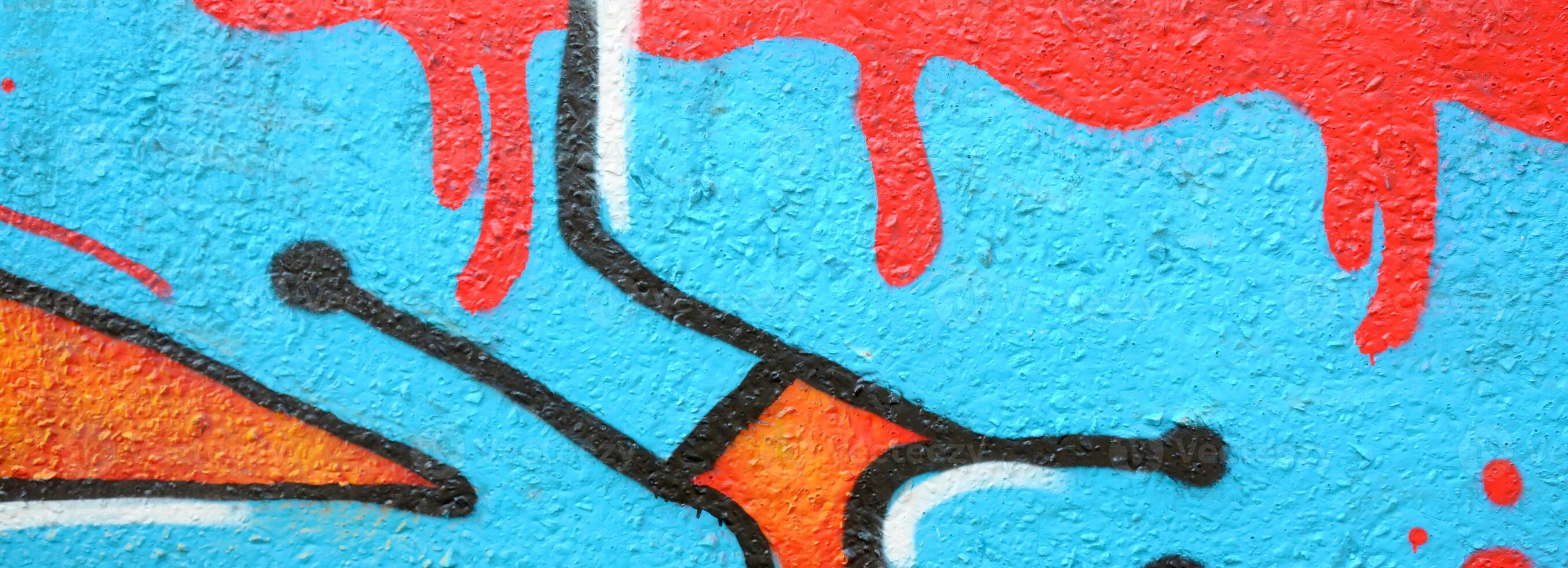 Colorful background of graffiti painting artwork with bright aerosol outlines on wall. Old school street art piece made with aerosol spray paint cans. Contemporary youth culture photo