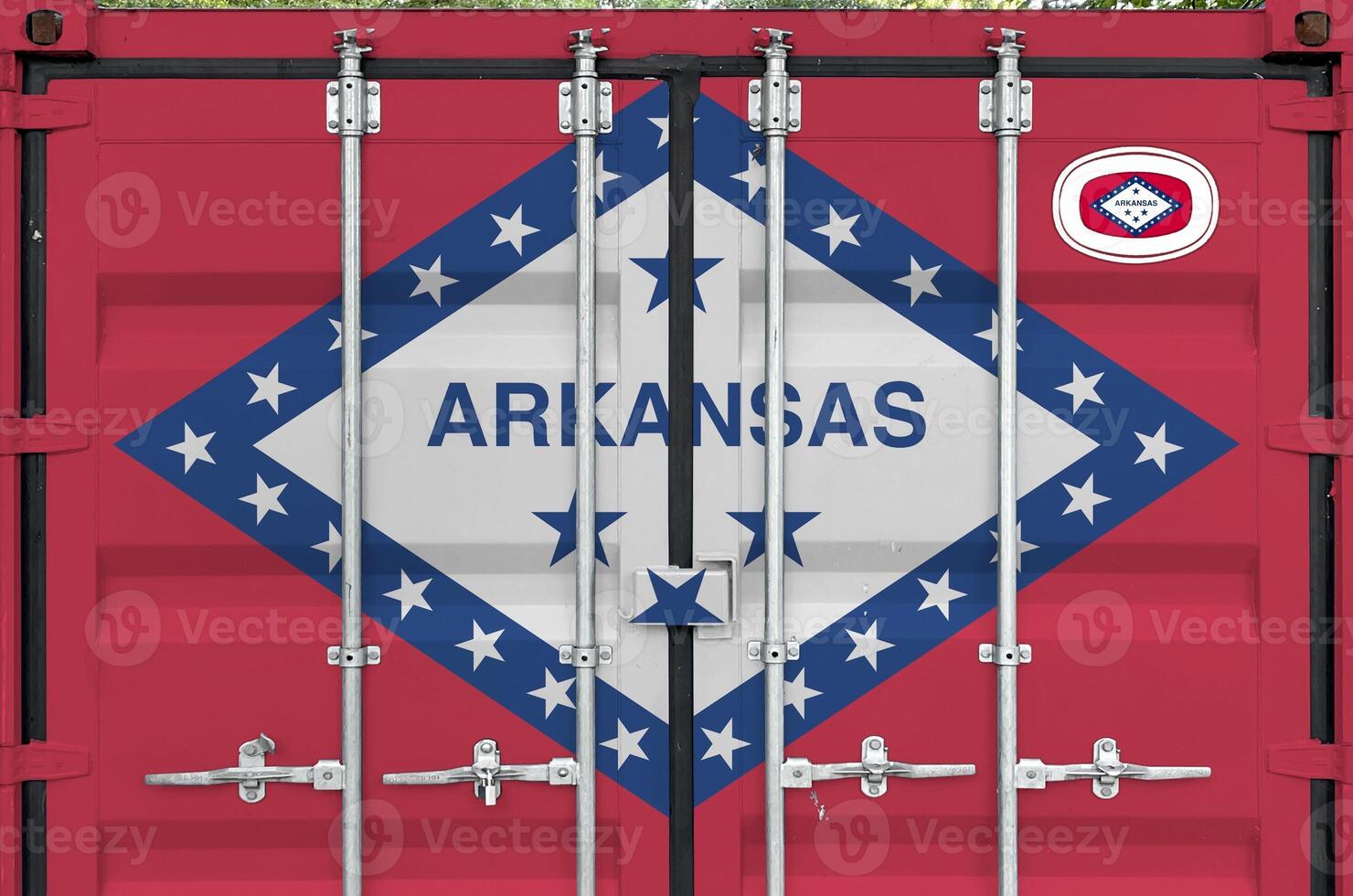 Arkansas US state flag depicted on metal doors of shipping cargo container outdoors in docks area photo