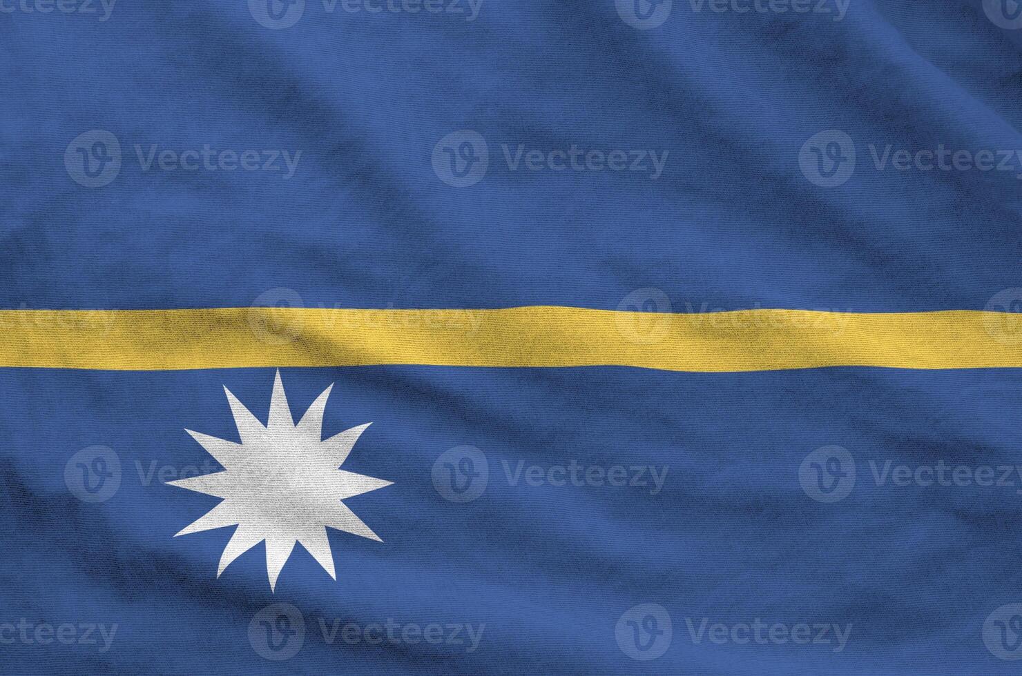Nauru flag depicted on folded wavy fabric of old cloth photo