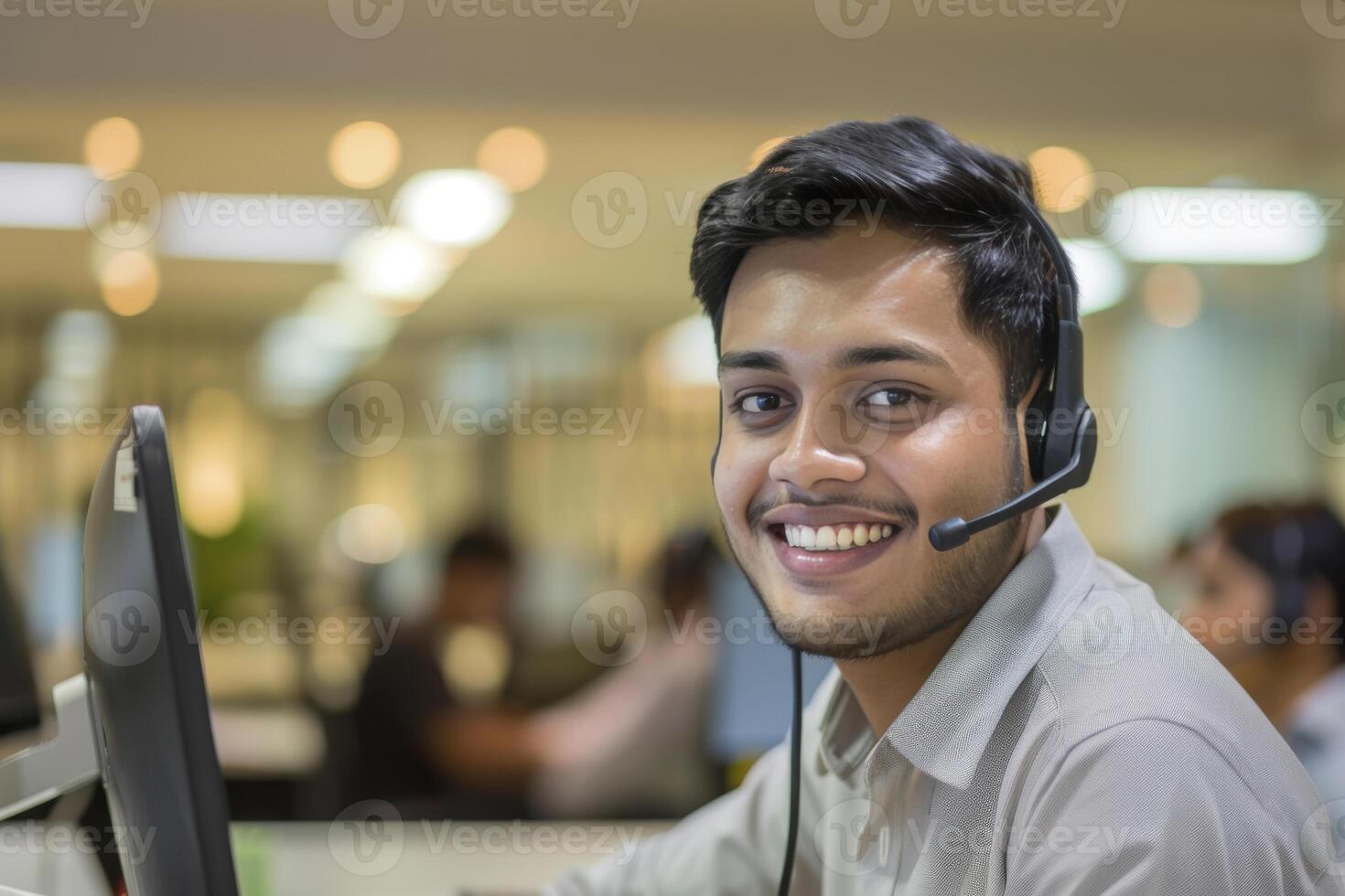 Happy professional successful business man using tablet and working in office photo