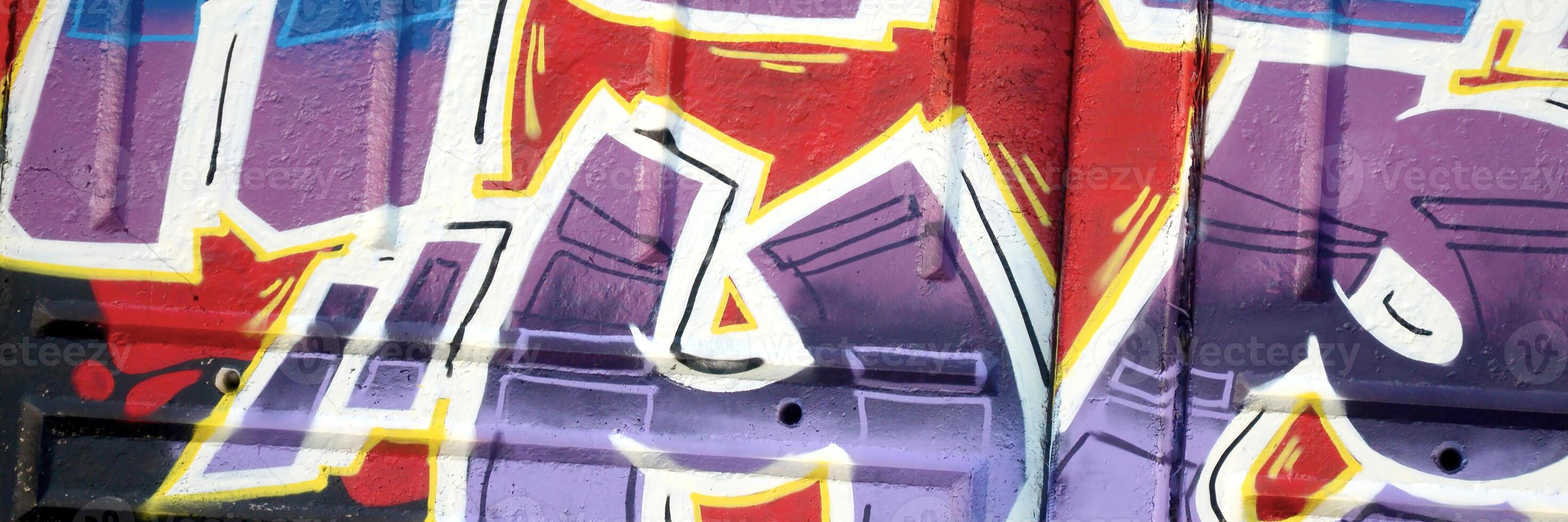 Colorful background of graffiti painting artwork with bright aerosol outlines on wall. Old school street art piece made with aerosol spray paint cans. Contemporary youth culture photo