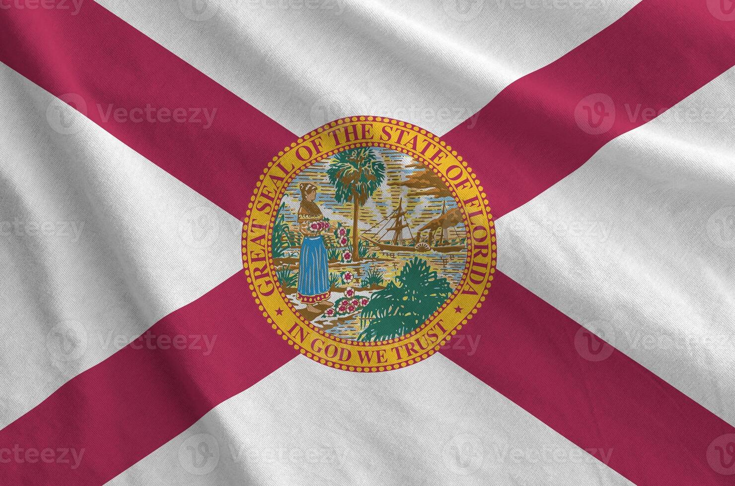 Florida US state flag depicted on folded wavy fabric of old cloth photo