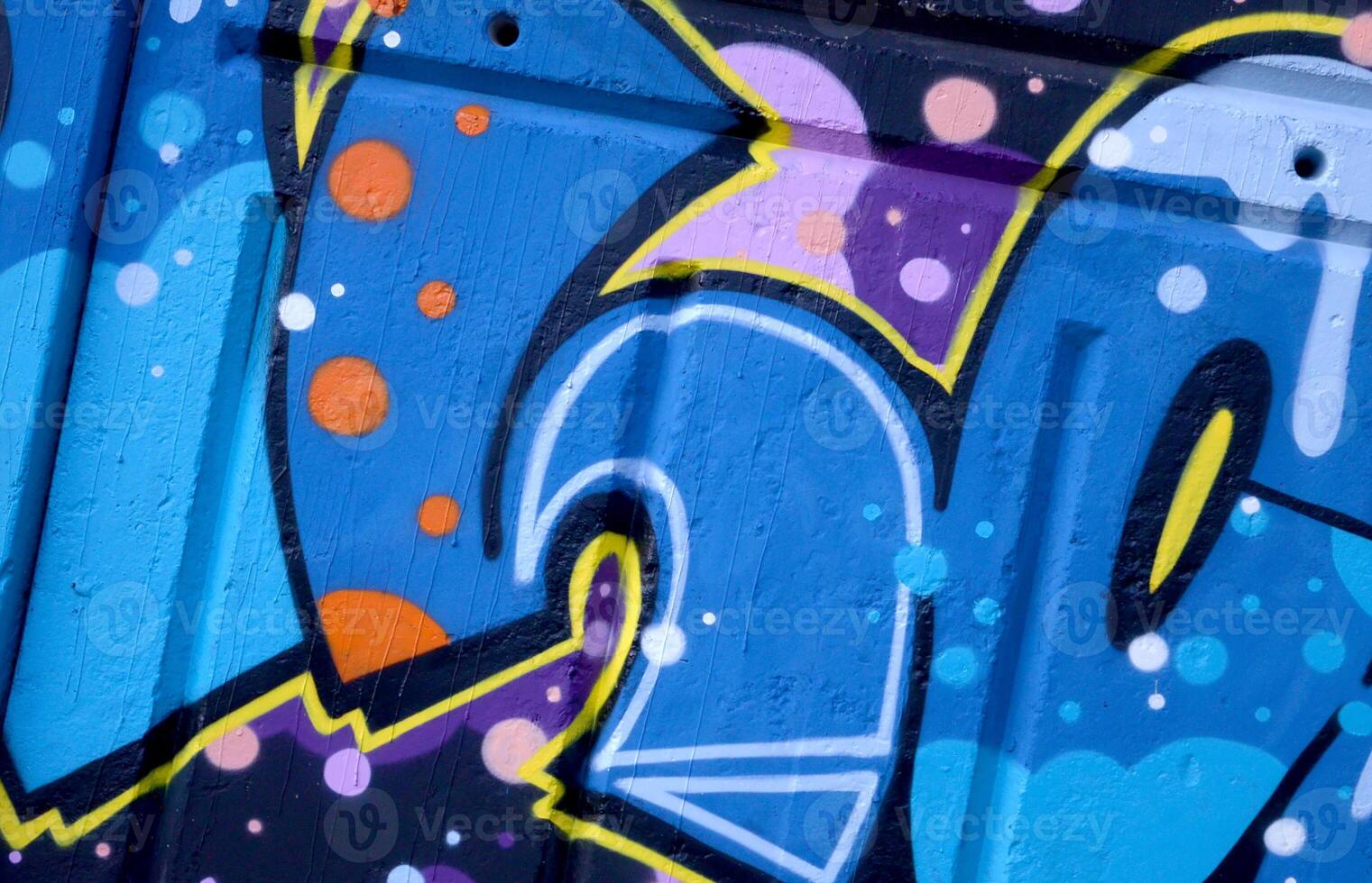 Colorful background of graffiti painting artwork with bright aerosol outlines on wall. Old school street art piece made with aerosol spray paint cans. Contemporary youth culture photo