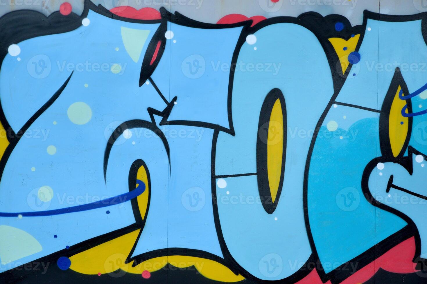 Colorful background of graffiti painting artwork with bright aerosol outlines on wall. Old school street art piece made with aerosol spray paint cans. Contemporary youth culture photo