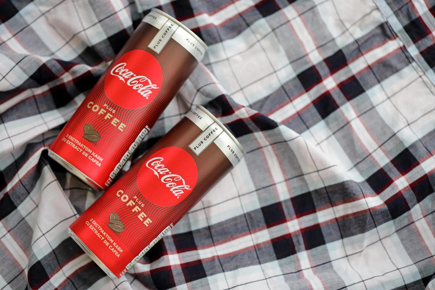 KYIV, UKRAINE - OCTOBER 31, 2023 Can of Coca Cola with coffee flavor. Closed tin can of drink with special design photo