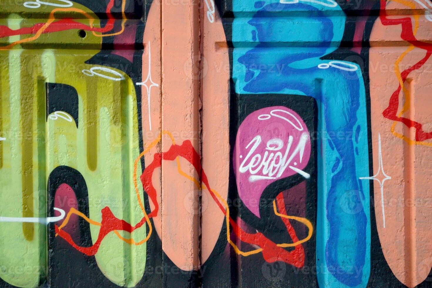 Colorful background of graffiti painting artwork with bright aerosol outlines on wall. Old school street art piece made with aerosol spray paint cans. Contemporary youth culture photo