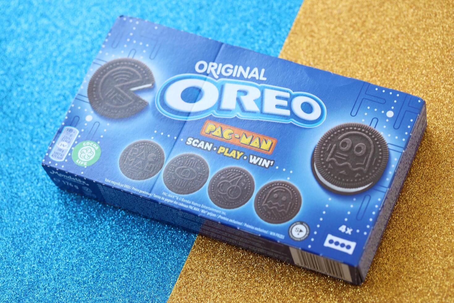 KYIV, UKRAINE - APRIL 20, 2024 Oreo pac-man crispy cookies packs. The brand Oreo owned by american company Mondelez international photo