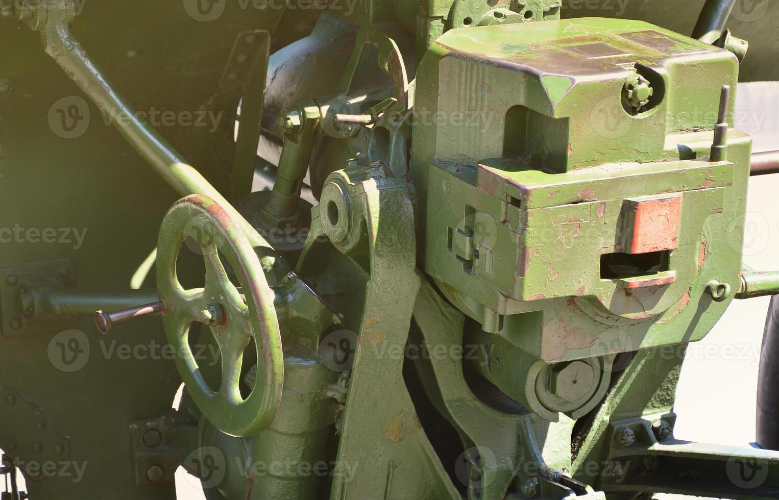 A close-up mechanism of a portable weapon of the Soviet Union of World War II, painted in a dark green color photo