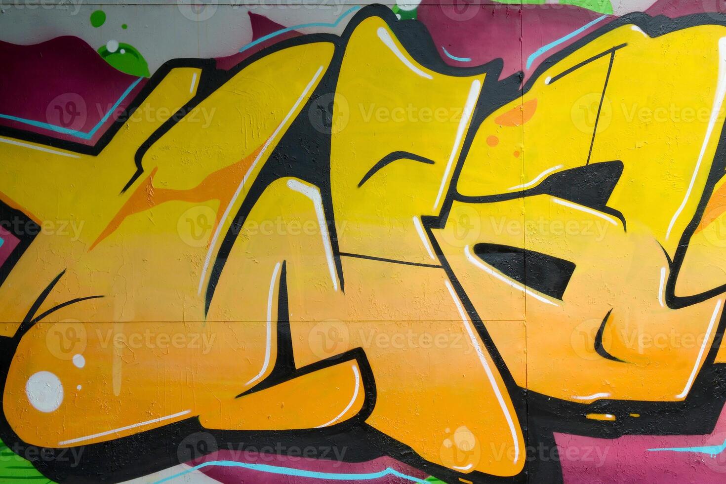 Colorful background of graffiti painting artwork with bright aerosol outlines on wall. Old school street art piece made with aerosol spray paint cans. Contemporary youth culture photo