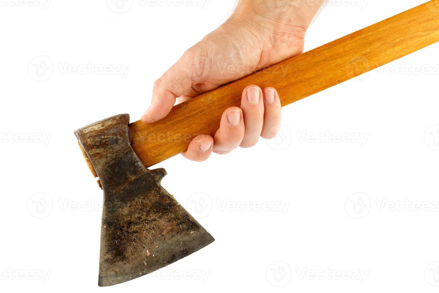 Hand holds ax isolate close-up photo