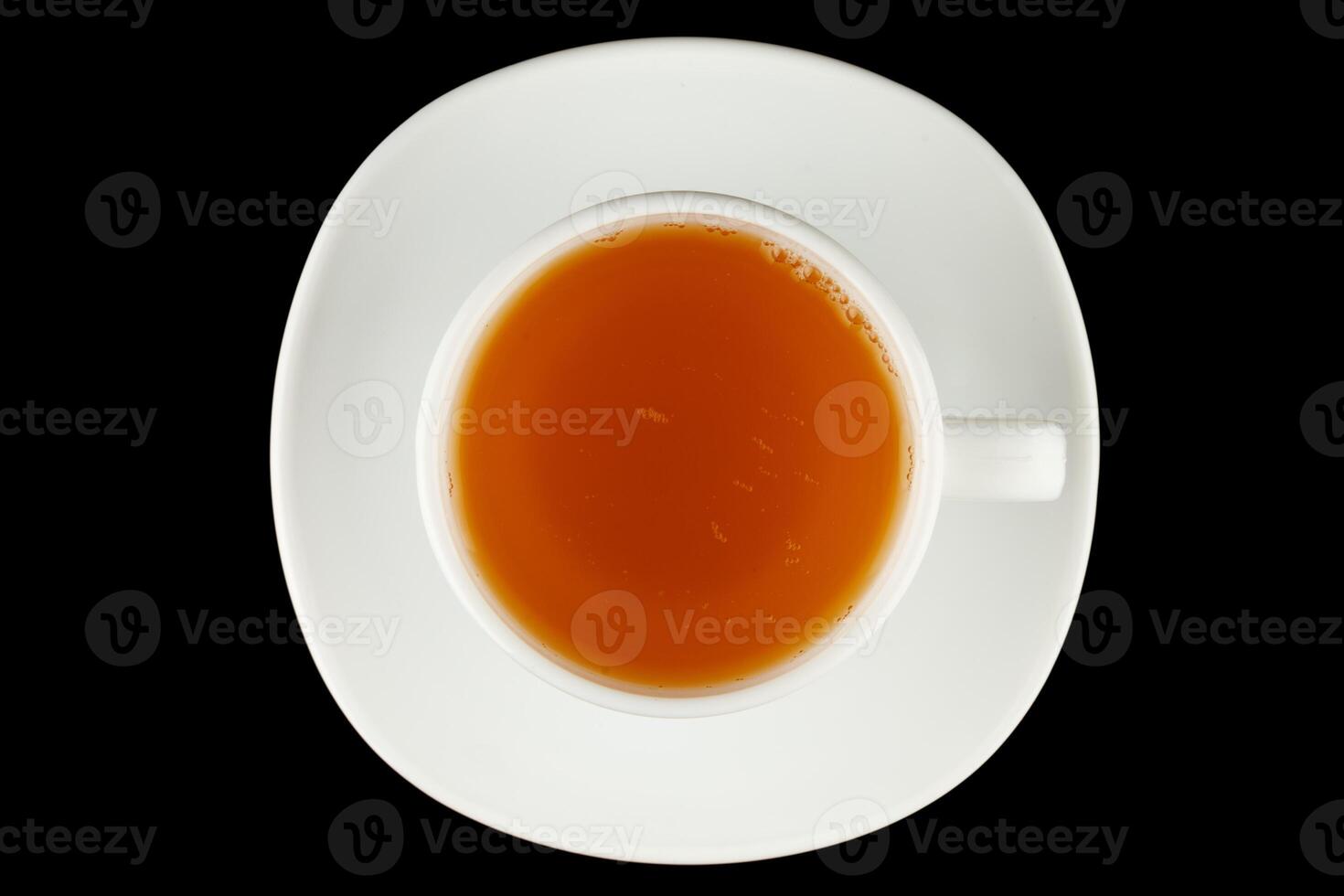 Green tea in a cup on a black background photo
