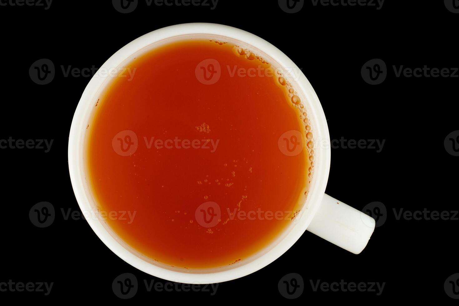 Green tea in a cup on a black background photo