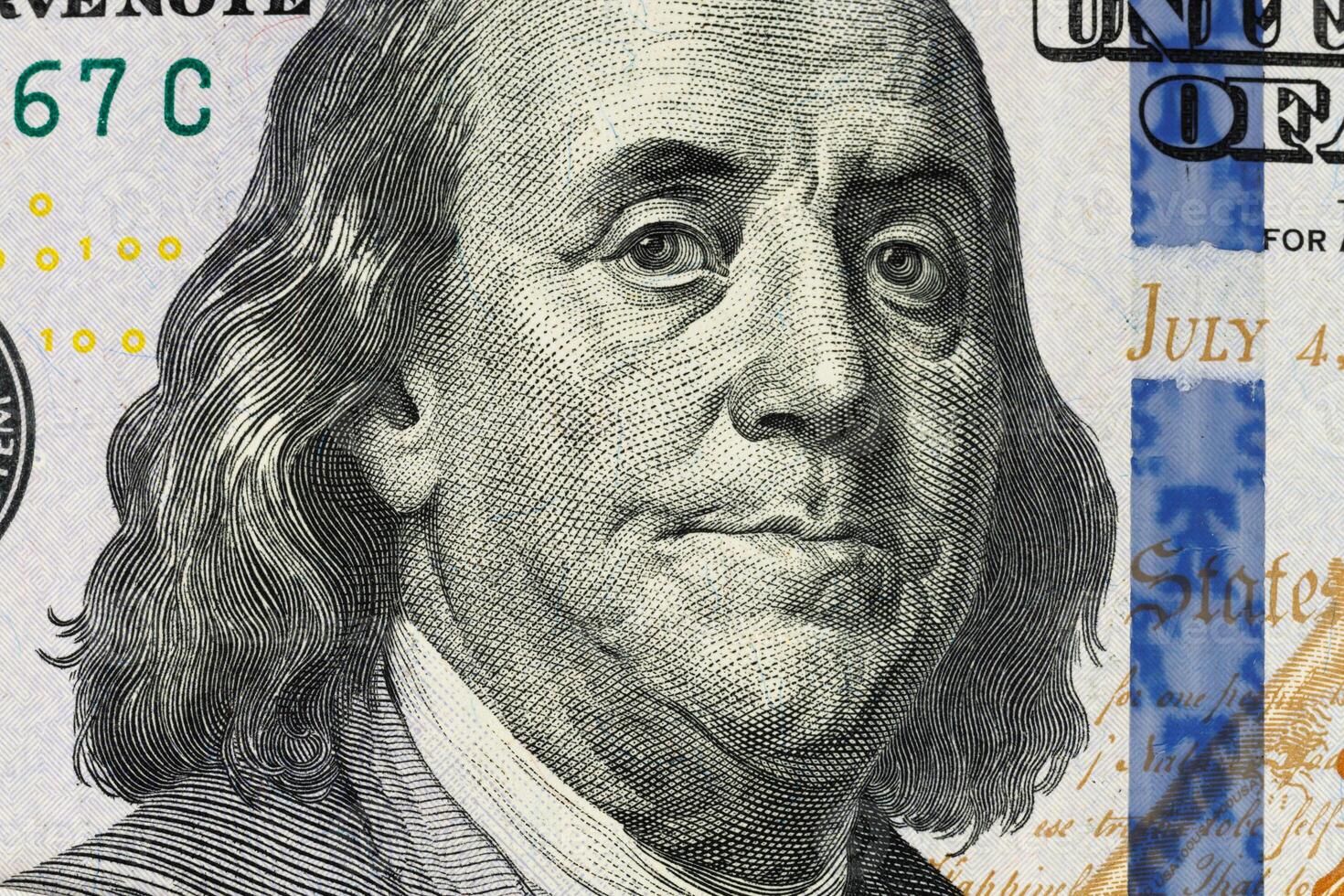 100 dollars Benjamin Franklin close-up photo