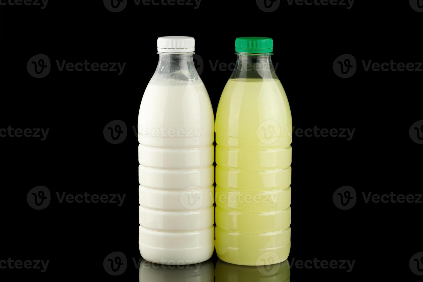 Milk and whey in bottles photo