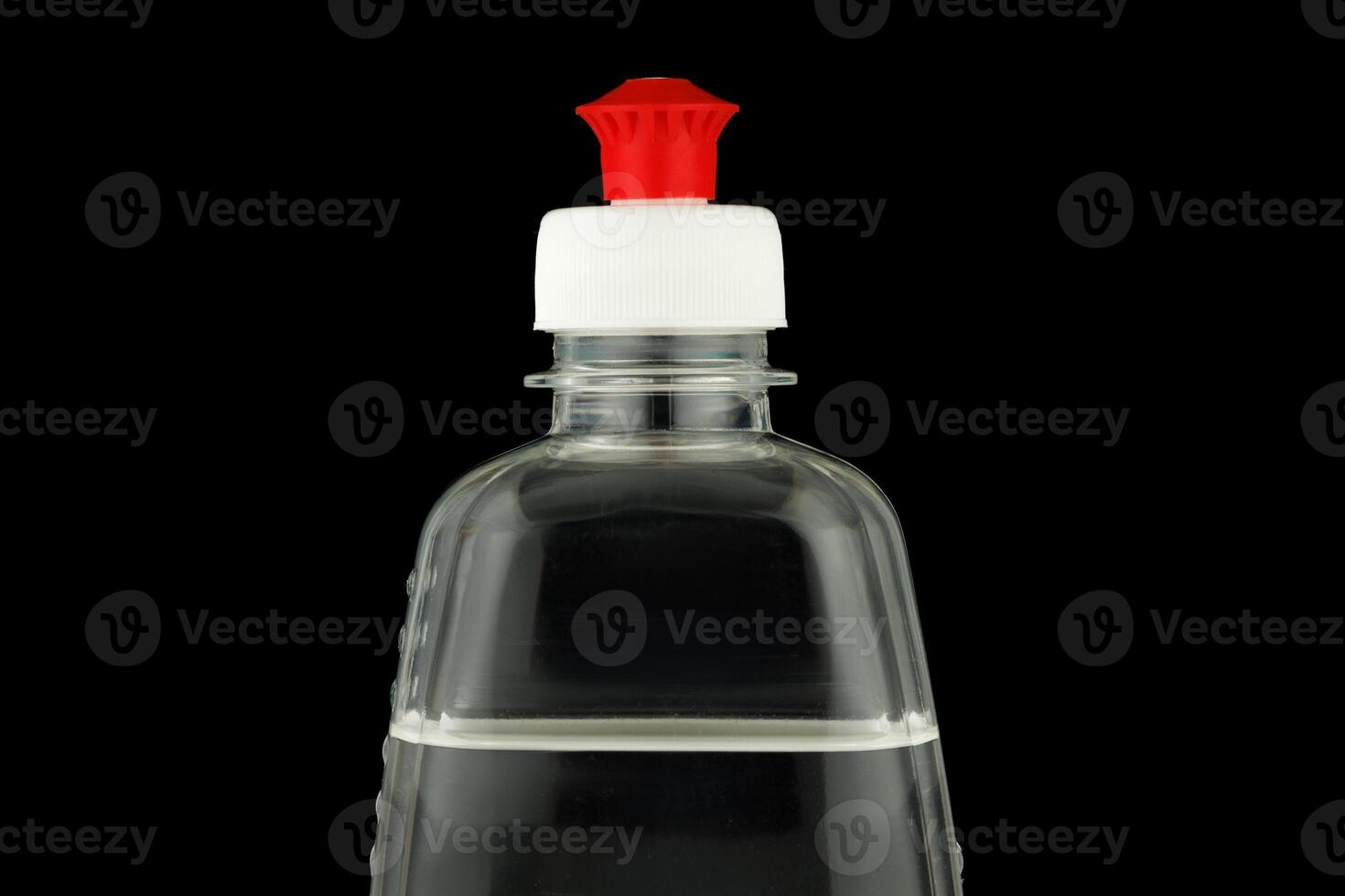 Transparent jar with antiseptic close-up photo